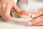 Поломка зубного протеза